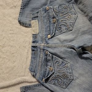 Men's buckle jeans says 32 by 32 bootcut, button fly